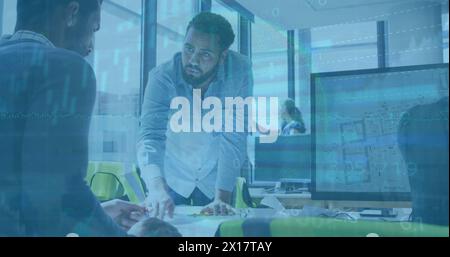 Image of financial data processing over diverse architects having meeting in office Stock Photo