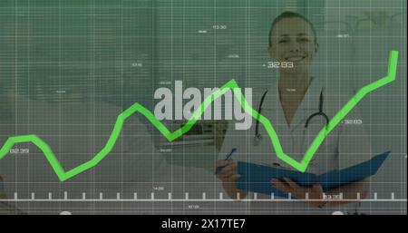 Image of data processing over caucasian female doctor Stock Photo