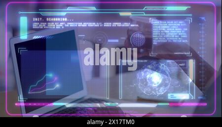 Image of digital interface over person using laptop Stock Photo