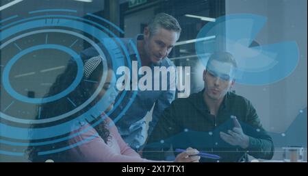 Image of scope scanning over diverse business people talking in office Stock Photo