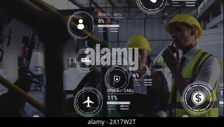 Image of data processing against diverse male and female supervisors working at warehouse Stock Photo