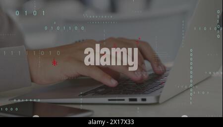 Image of data processing over hands using laptop Stock Photo