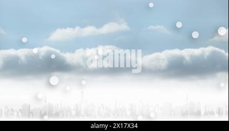 Image of multiple white spots floating over clouds in the blue sky Stock Photo