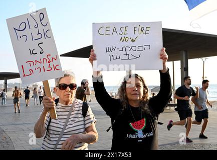 Tel Aviv, Israel. 15th Apr, 2024. People hold placards with a warning to U.S. President Joe Biden to stand for peace and not trust Israeli Prime Minister Benjamin Netanyahu at a protest demanding the end of the Israel-Hamas War outside the Tel Aviv branch of the U.S. Embassy on Monday, April 15, 2024. Photo by Debbie Hill/ Credit: UPI/Alamy Live News Stock Photo