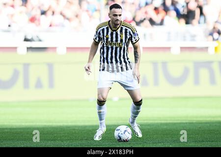 Federico Gatti of Juventus controls the balls during the Serie A football match between Torino FC and Juventus at the Stadio Olimpico Grande Torino in Stock Photo