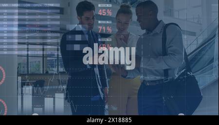 Image of financial data processing over three diverse business people Stock Photo