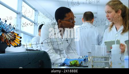 Image of mathematical equations over group of diverse scientists in lab Stock Photo