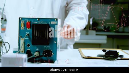 Image of mathematical equations over caucasian male scientist in lab Stock Photo