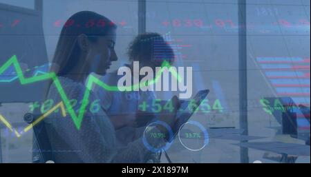Image of infographic interface over multiracial coworkers working over digital tablet at office Stock Photo