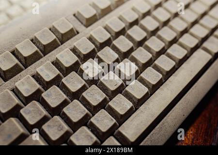 Old vintage computer mechanical keyboard in dust, computer keyboard from the 1980s Stock Photo