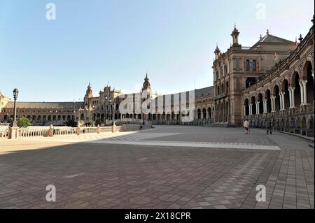 Plaza de Espana, Seville, View of a spacious square with historic buildings under a clear blue sky, Seville, Andalusia, Spain Stock Photo