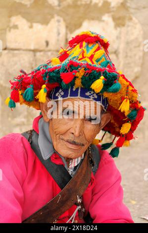 Portrait, Water seller, Meknes, Morocco, Africa, Portrait of an elderly person with colourful headgear in traditional outfit, Northern Morocco Stock Photo