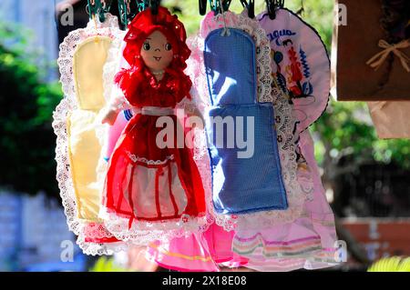 Leon, Nicaragua, Handmade dolls in traditional dresses offered at a market stall, Central America, Central America Stock Photo