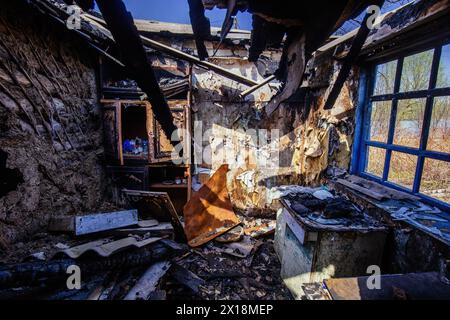 Burnt house interior. Consequences of fire. Stock Photo