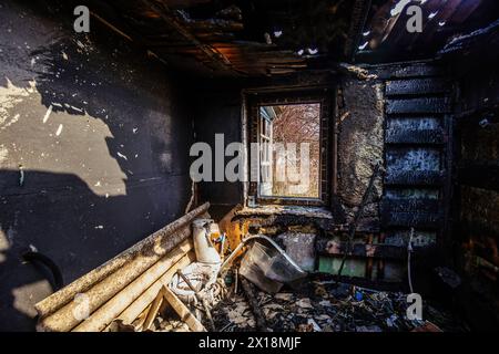 Burnt house interior. Consequences of fire. Stock Photo