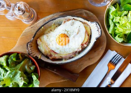 Swiss cheese crust with fried egg Stock Photo