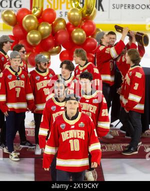 Denver, Colorado, USA. 15th Apr, 2024. DU Men's Hockey team exits the ice to sign autographs after the DU Victory celebration at Magness Arena Monday evening. DU celebrated it's 10th. Mens Hockey Championship. (Credit Image: © Hector Acevedo/ZUMA Press Wire) EDITORIAL USAGE ONLY! Not for Commercial USAGE! Credit: ZUMA Press, Inc./Alamy Live News Stock Photo