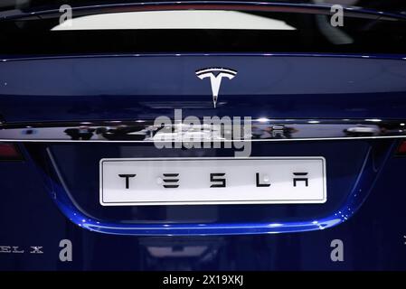 File photo - Tesla Model X on display on the first press day of Paris Motor Show 2016, known as 'Mondial de l'Automobile' in Paris, France on September 29, 2016. Tesla will lay off more than 10% of its global workforce, according to a memo sent to employees by CEO Elon Musk. The company's shares closed down more than 5% on Monday. Tesla had 140,473 employees as of December 2023. Tesla shares have taken a bruising in recent months, falling 31% year to date. While electric vehicle sales are still gaining popularity worldwide, their sales growth rate has slowed especially for Tesla. The company n Stock Photo