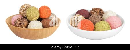 A variety of different truffles in a wooden and ceramic bowl Isolated on a white background Stock Photo