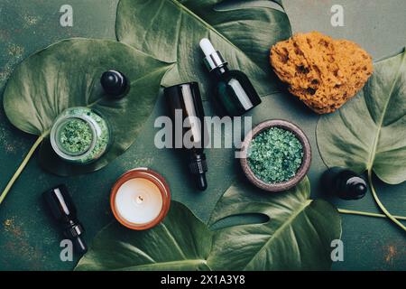 zero waste eco friendly hygiene bathroom concept. reusable cosmetic bottles, essential oils droppers, candle Stock Photo