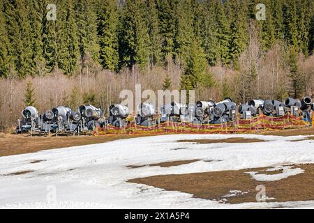 on-working snow generator on a slope without snow gear at a resort on a sunny day. Active recreation Stock Photo