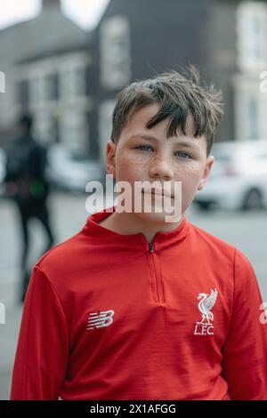 Young boy Liverpool FC fan at Anfield , Liverpool . Stock Photo