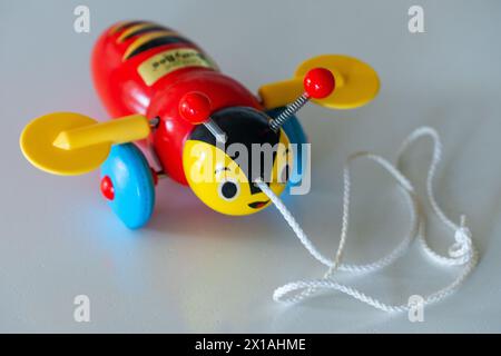 A classic New Zealand childrens toy, the NZ wooden Busy Bee. Stock Photo