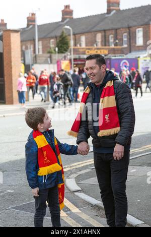 Father and son liverpool fc supporter an hour before kick-of at Anfield. Stock Photo