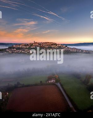An aerial view at dawn, of the medieval hilltop village of Cordes-sur-Ciel, in the Tarn department, France. Stock Photo