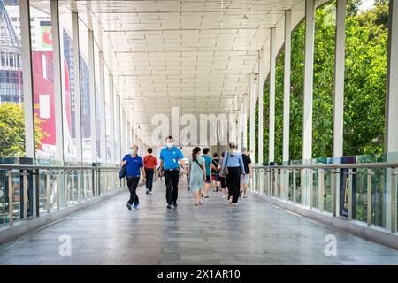 Ratchaprasong R Walk Pedestrians make their way along Ratchaprasong Sky Walk, above ...