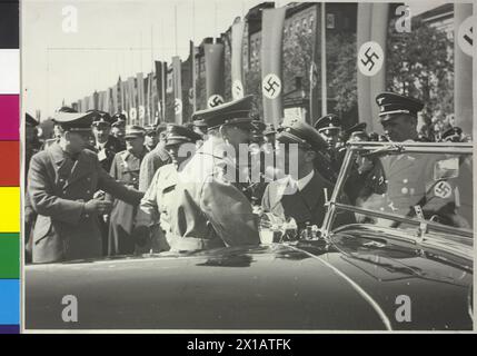 Hitler in Vienna, Hitler with Goebbels after the in front of the adorned Westbahnhof raiwlay station appropriable car, 9.4.1938 - 19380409 PD0023 - Rechteinfo: Rights Managed (RM) Stock Photo