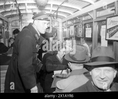 In the tram, guard in the sidecar of the line double hump with passengerss, 09.12.1950 - 19501209 PD0002 - Rechteinfo: Rights Managed (RM) Stock Photo