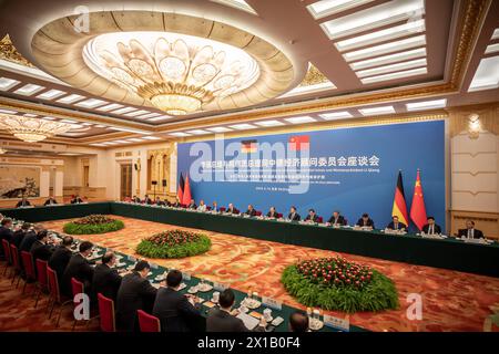 Beijing, China. 16th Apr, 2024. Federal Chancellor Olaf Scholz (SPD, 10th from right) takes part in a meeting of the Sino-German Business Advisory Committee alongside Li Qiang (9th from right), Premier of China, in the Great Hall of the People. The visit to Beijing is the conclusion of Scholz's three-day trip through China. Credit: Michael Kappeler/dpa/Alamy Live News Stock Photo