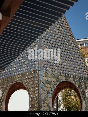 Bermondsey Market place, clock tower pavilion and corrugated roof detail. The Blue, London, United Kingdom. Architect: Assemble Architects, 2022. Stock Photo