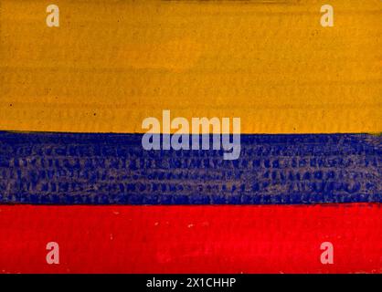 Flag of Colombia painted on cardboard with watercolors and a brush. Stock Photo