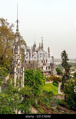 Elevated view Capela da Santissima Trindade and Quinta palace. The Quinta da Regaleira park, Sintra, Portugal Stock Photo