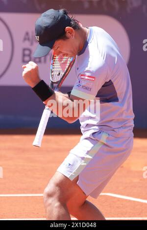 Barcelona, Spain: 16th April 2024; Real Club de Tenis Barcelona 1899, Barcelona, Spain: ATP 500 Barcelona Open Banc Sabadell Tennis, Day 2;  Yoshihito Nishioka (JPN) wins a game during his match against  Jaume Munar (ESP) Credit: Action Plus Sports Images/Alamy Live News Stock Photo