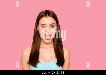 Closeup studio photo portrait of cheerful glad comic attractive flirty coquettish she her student blinking close eye looking at camera isolated bright Stock Photo