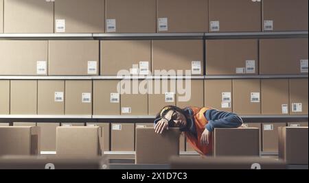 Exhausted female warehouse worker sleeping at work, work burnout concept Stock Photo