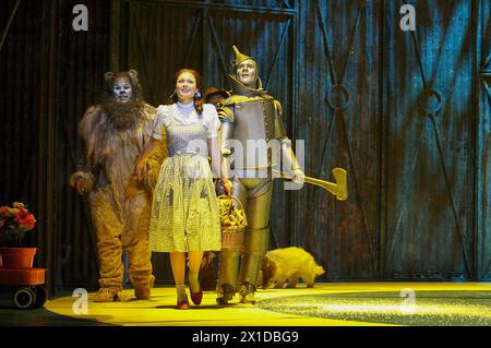 'Follow the yellow brick road' - l-r: Gary Wilmot (Cowardly Lion), Sian Brooke (Dorothy), Adam Cooper (Tin Man) with Bobby as 'Toto' in THE WIZARD OF OZ at the Royal Festival Hall, Southbank Centre, London SE1  29/07/2008 after the novel by by L. Frank Baum  music & lyrics: Harold Arlen & E. Y. Harburg   adapted by John Kane for the RSC  design: Michael Vale  lighting: Mike Gunning  choreography: Nick Winston  director: Jude Kelly  Royal Festival Hall (RFH), Southbank Centre, London SE1    29/07/2008 Stock Photo