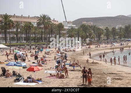 Los Cristianos, Tenerife, April 16th 2024 - Tourists Tourists enjoy the sun, sand and sea at Los Cristianos in Tenerife, despite anti-tourist anger amongst some locals. Credit: Stop Press Media/Alamy Live News Stock Photo