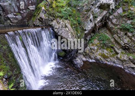 Passage channel and water cascade to Senhora da Piedade river beach in Serra da Lousã- Portugal. Stock Photo