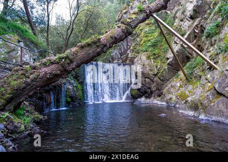 Passage channel and water cascade to Senhora da Piedade river beach in Serra da Lousã- Portugal. Stock Photo