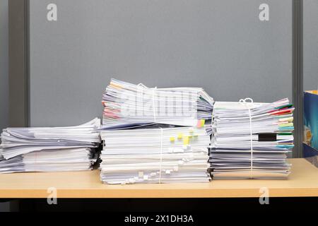Close up of business documents stack on desk , report papers stack Stock Photo