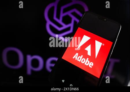 Poland. 16th Apr, 2024. In this photo illustration, an Adobe logo is displayed on a smartphone with an OpenAI logo in the background. (Photo by Omar Marques/SOPA Images/Sipa USA) *** Strictly for editorial news purposes only *** Credit: Sipa USA/Alamy Live News Stock Photo