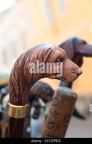 Flea Market, Ceramic Dogs Head Walking Stick for Sale Stock Photo