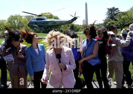 Washington, United States. 16th Apr, 2024. Reporters are blown by the wind as President Joe Biden departs from the White House on Marine One in Washington DC, on Tuesday April 16, 2024. Photo by Yuri Gripas/UPI Credit: UPI/Alamy Live News Stock Photo