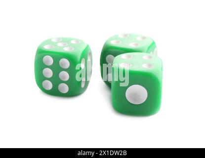 Three green game dices isolated on white Stock Photo