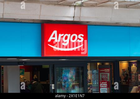Birmingham, UK 16th April 2024: Exterior sign of the UK based catalogue shop, Argos Stock Photo