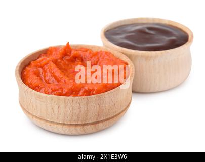 Different fresh marinades in wooden bowls isolated on white Stock Photo